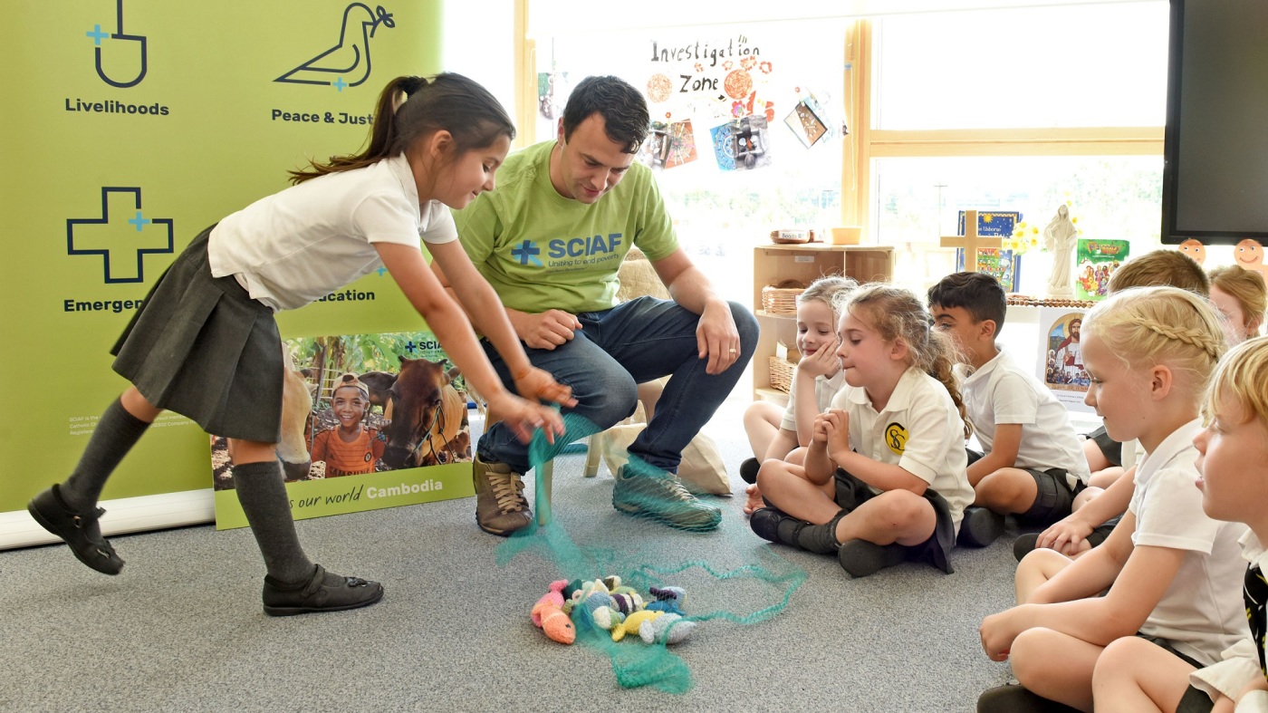 Primary school pupils with Mark Booker - cover