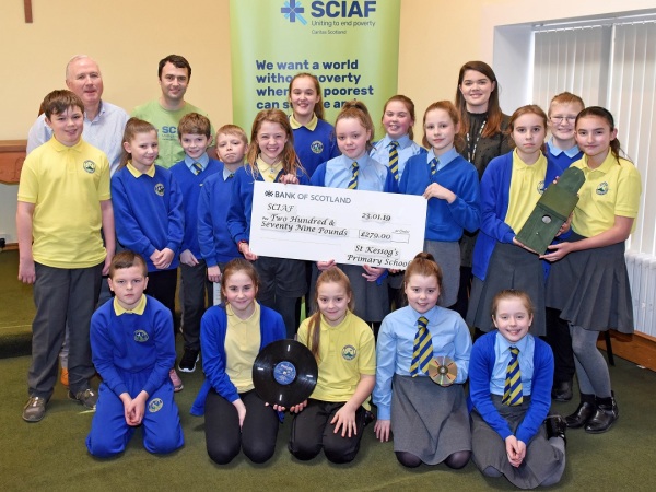 Mark Booker and Michael Rainey at St Kessogs - Talented fundraiser - school pupils