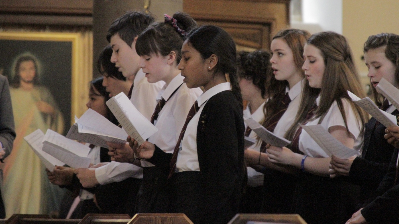 Pupils singing at mass