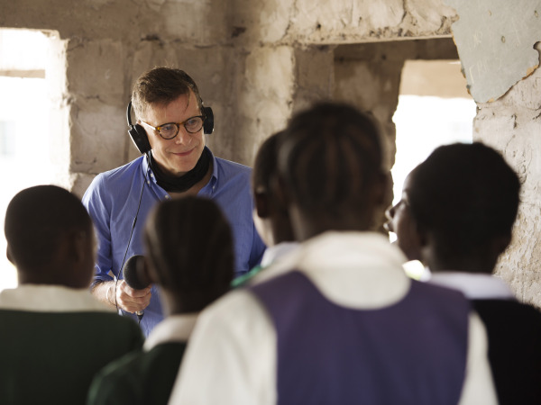 Ricky Ross interviewing people in Zambia